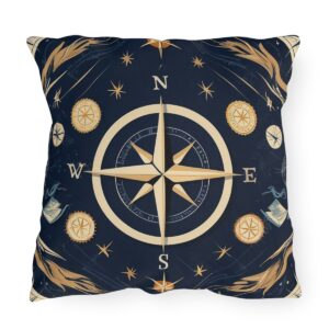 Outdoor pillow with navy background and gold nautical compass design