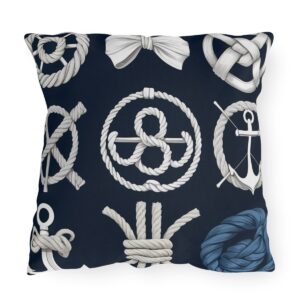 outdoor pillow featuring various white nautical knots and an anchor on a dark blue background