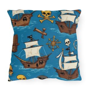 outdoor pillow featuring playful pirate ships, skulls, crossbones, and nautical elements on a blue background