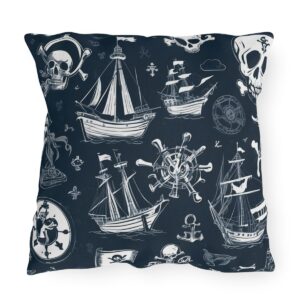 outdoor pillow featuring pirate ships, skulls, and nautical symbols in white on a dark background