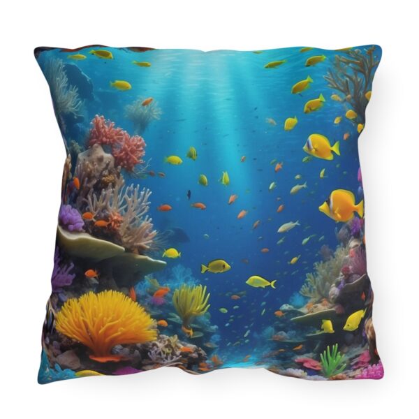 outdoor pillow featuring a vibrant underwater scene with colorful fish and coral reefs in a blue ocean