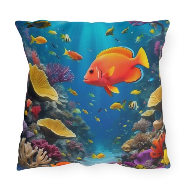 outdoor pillow featuring a vibrant underwater scene with colorful fish and coral reefs in blue ocean waters