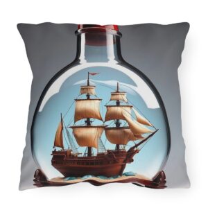 outdoor pillow featuring a detailed sailing ship with full sails inside a glass bottle on a wooden stand