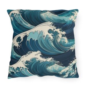 outdoor pillow featuring crashing ocean waves in shades of blue and white