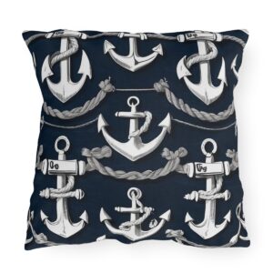 outdoor pillow featuring multiple white anchors with ropes on a navy blue background