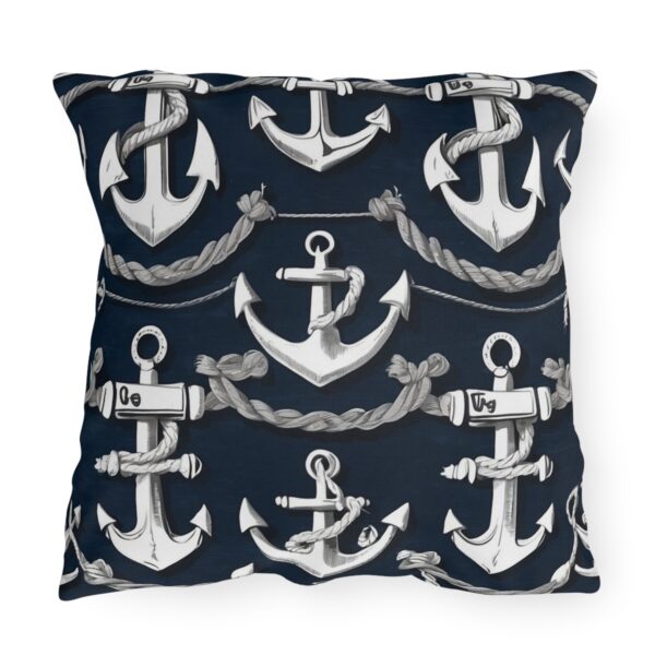 outdoor pillow featuring multiple white anchors with ropes on a navy blue background