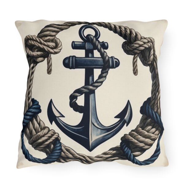 outdoor pillow featuring a navy blue anchor with thick ropes on a beige background