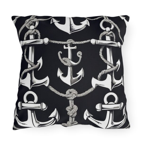 outdoor pillow featuring multiple white anchors and rope design on a black background