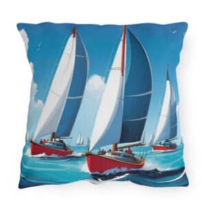 outdoor pillow featuring red sailboats with white and blue sails on a vibrant ocean background