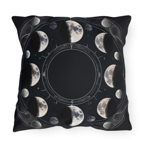 outdoor pillow featuring moon phases in a circular arrangement on a black background