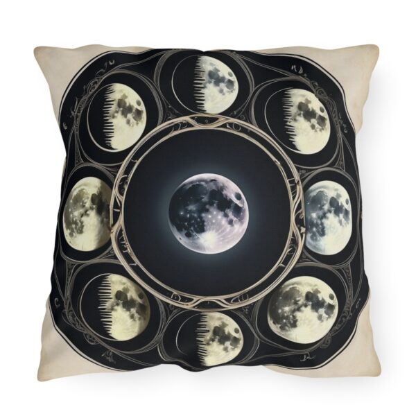 outdoor pillow featuring moon phases in a circular design on a black background