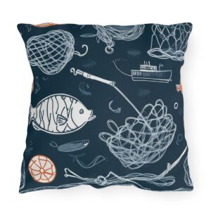 Outdoor pillow featuring a navy blue background with fishing-themed illustrations of nets, fish, and boats