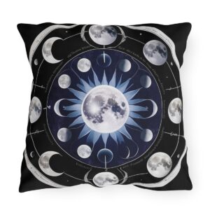 outdoor pillow featuring moon phases with blue sunburst design on a black background