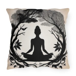 Outdoor pillow featuring a silhouette of a person in a yoga pose surrounded by trees