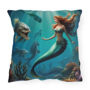 Outdoor pillow featuring an underwater scene with a mermaid and sea creatures, including a large fish