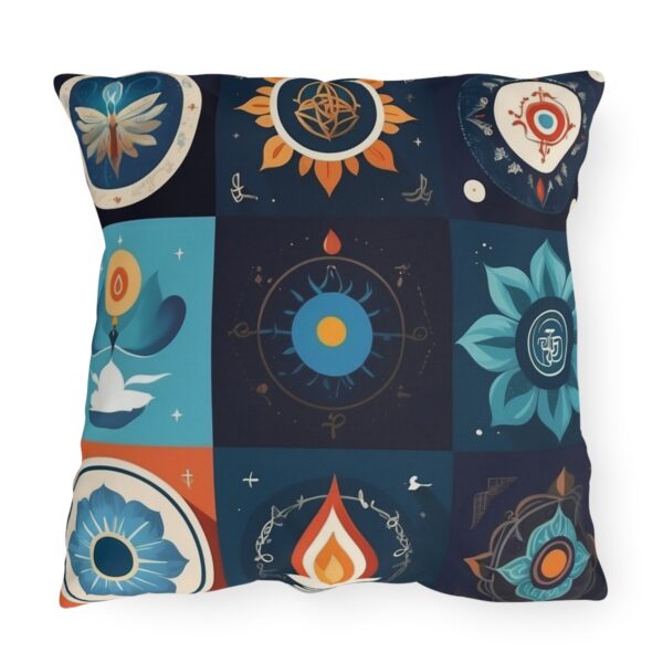 Outdoor pillow with a design featuring various spiritual icons and symbols in a colorful grid pattern.