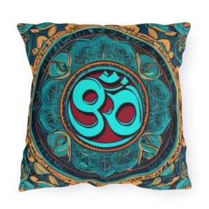 Outdoor pillow with a design featuring the sacred Om symbol in turquoise and red on a dark background with intricate gold and teal floral patterns.