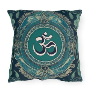 Outdoor pillow with a design featuring the sacred Om symbol in white on a teal and dark background with intricate patterns.