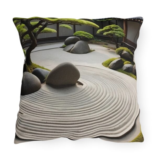 Outdoor pillow with a design featuring a Japanese Zen garden with meticulously raked sand patterns, rocks, and green shrubs.