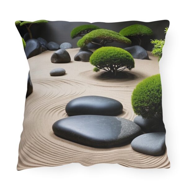 Outdoor pillow with a design featuring a Japanese Zen garden with sand patterns, rocks, and green shrubs.