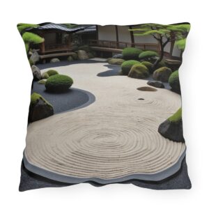 Outdoor pillow with a design featuring a Japanese Zen garden with sand patterns and green shrubs.