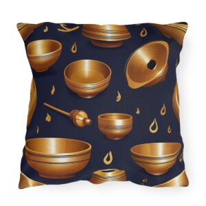 Outdoor pillow with a design featuring golden meditation bells and droplets on a dark blue background.