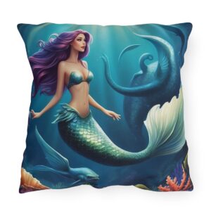 Outdoor pillow featuring an underwater scene with a mermaid and sea creatures