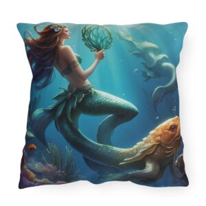 Outdoor pillow featuring an underwater scene with a mermaid holding seaweed and a large fish