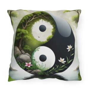 Outdoor pillow featuring a Yin Yang design with nature elements like flowers, trees, and water