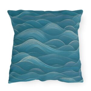 Outdoor pillow featuring a design of gentle wave patterns in various shades of blue