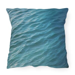 Outdoor pillow featuring a design of gentle blue ocean waves