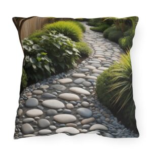 Outdoor pillow featuring a Zen pebble path surrounded by lush greenery