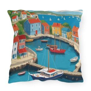 Outdoor pillow with a colorful depiction of a portside village and boats