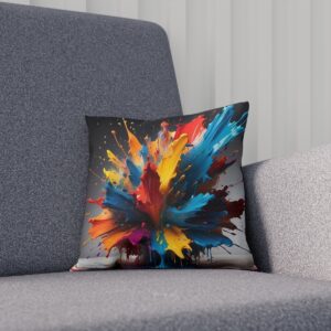 Cushion with colorful explosive art design on a gray chair