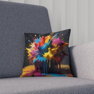 Colorful paint splatter cushion on dark gray chair