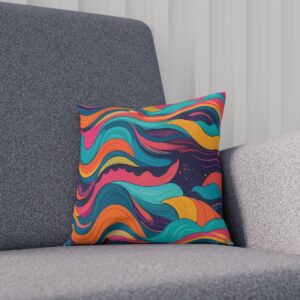 Cushion with neon marbled waves on gray chair