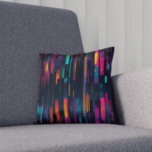 Neon streaked digital pattern cushion on a gray armchair