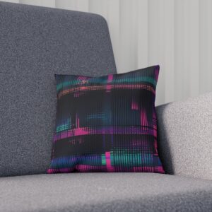 Cushion with digital glitch pattern on gray chair