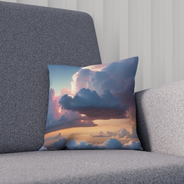 Sunset clouds printed cushion on a sleek gray chair