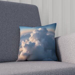 Cushion with fluffy cloud imagery on a cozy gray chair