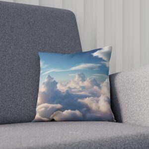 Cushion with blue sky and cloud print on a gray chair