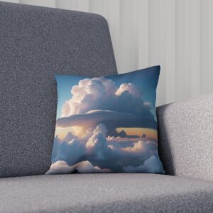 Cushion with cloudscape print on a gray chair