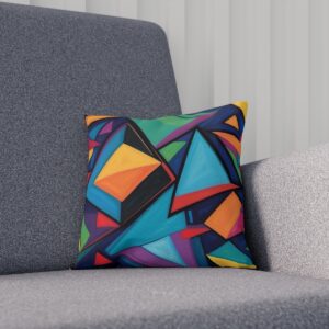 Cushion with bold geometric pattern in vibrant colors on a sofa.