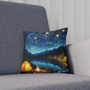 Cushion with a Van Gogh-inspired starry night camping scene on a sofa.