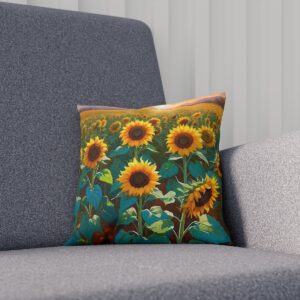 Cushion with sunflower print on a dark background on a couch.