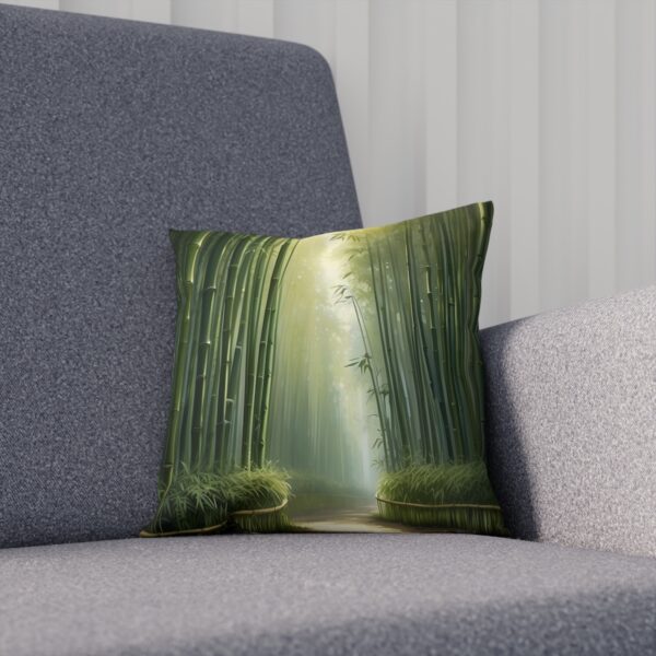 Decorative cushion with a peaceful bamboo forest and sunlight on a couch.