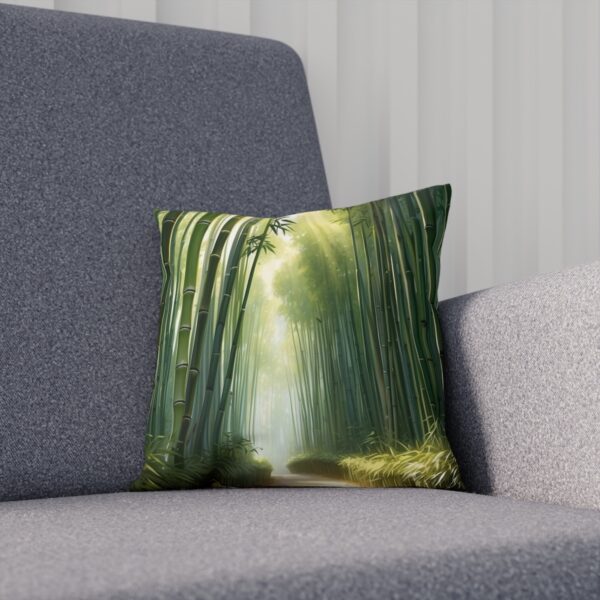 Cushion depicting a sunlight-dappled bamboo forest on a sofa.