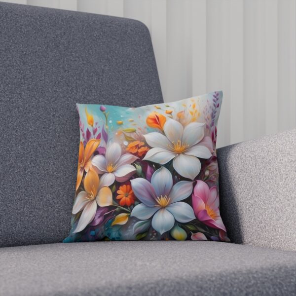 Colorful floral cushion with diverse flowers on grey sofa