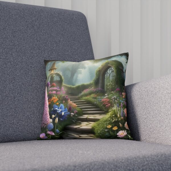 Cushion with a pathway through a blooming garden and iron gate on sofa