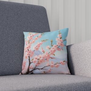 Cherry blossom branch on blue sky cushion on sofa